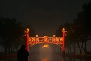 《灯塔守夜人》封面，夜色中的灯塔光柱